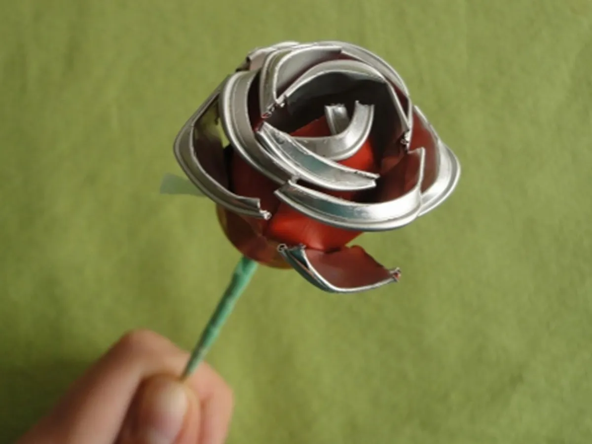 Así tenemos una flor con cápsulas nespresso espero que os sirva la explicación paso a paso.