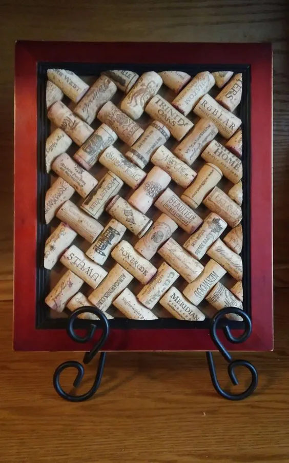 Red Burgundy with Black inside trim Lattice Wine Cork Trivet/Message Board Upcycled Great addition to your kitchen décor. This trivet will hold hot dishes and protect your wood table surface. If you have enough trivets you could add a picture hanger to it to make it a message board for all those important daily reminders. *****check out the cute push pins I have available****** Upcycled picture frame and Wine Corks Measures from outside of frame 12x10