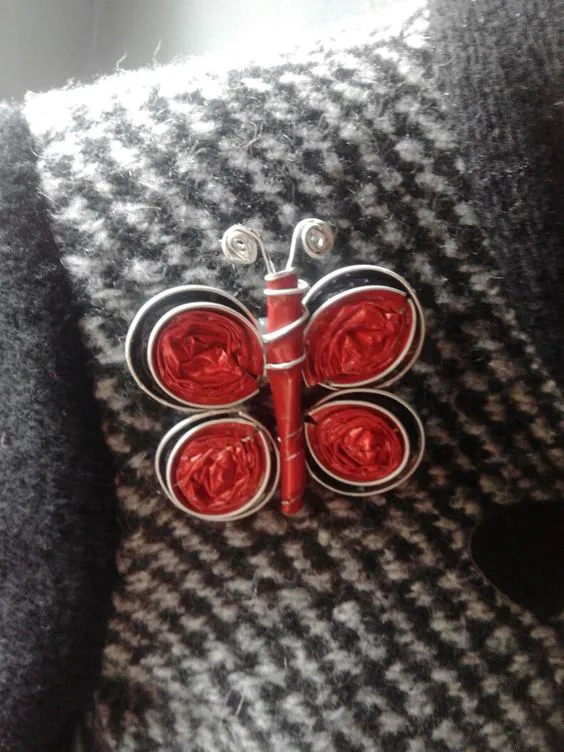 Accesorio para chaquetas y abrigos: broche mariposa nespresso: 