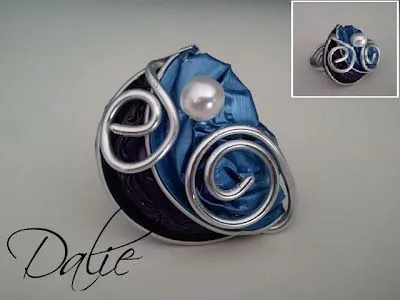 broche original con capsulas de café nespresso