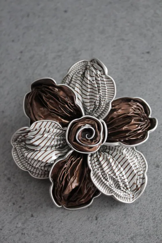 broche florar de capsulas de café