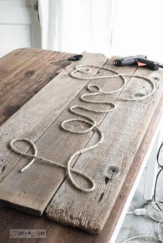 Love reclaimed wood rope and hot glue sign | unkyjunkinteriors.net More: 