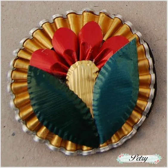 broche de flores con capsulas