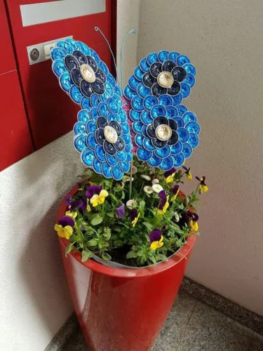 mariposa con capsulas de cafe